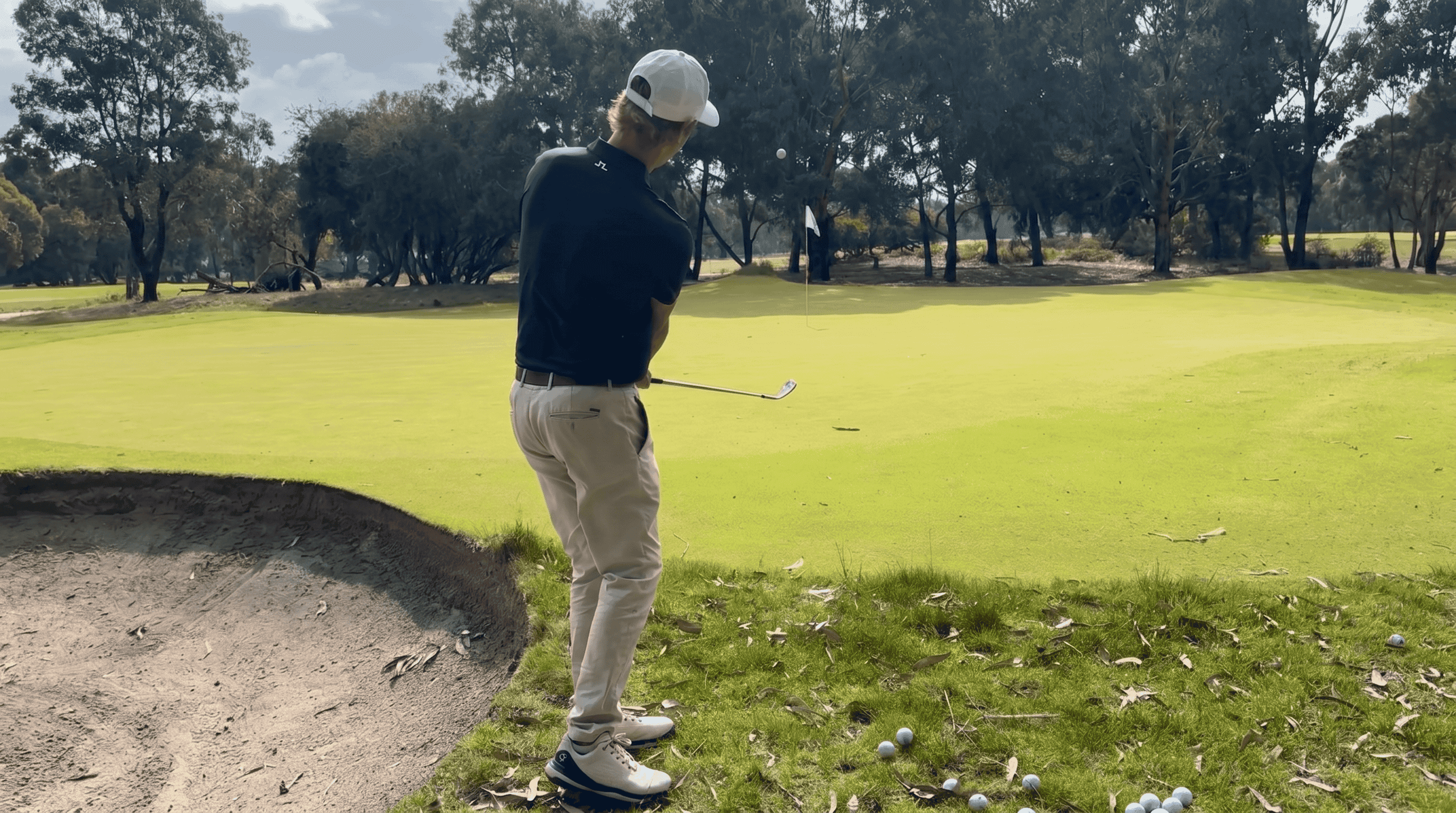 Andrew Cooper reviewing a short-game lesson from the Complete Blueprint