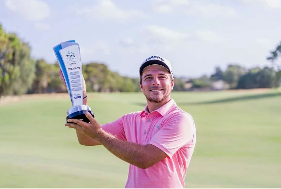 Tour winner David Micheluzzi holding the TPS Sydney trophy